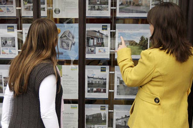 <p>File photo: Two women look at houses for sale </p>