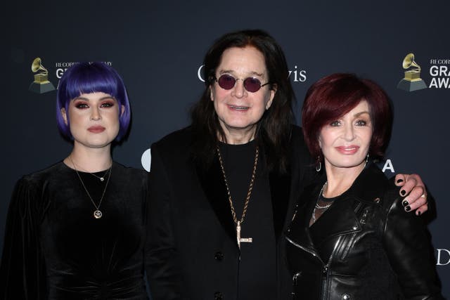 <p>Kelly Osbourne with parents Ozzy and Sharon in 2020</p>