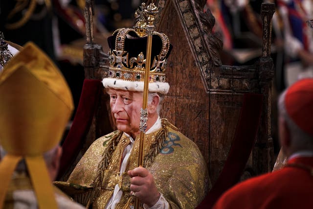 <p>King Charles III is crowned during his coronation on 6 May last year </p>